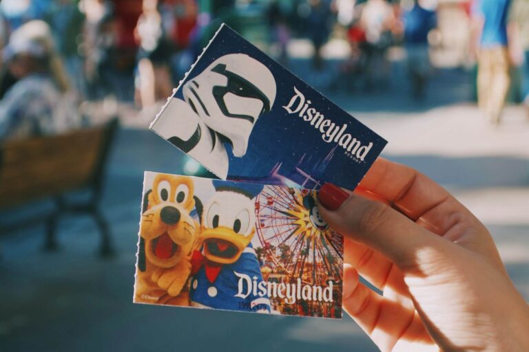 Disneyland tickets with images of Pluto, Donald Star Wars on the front