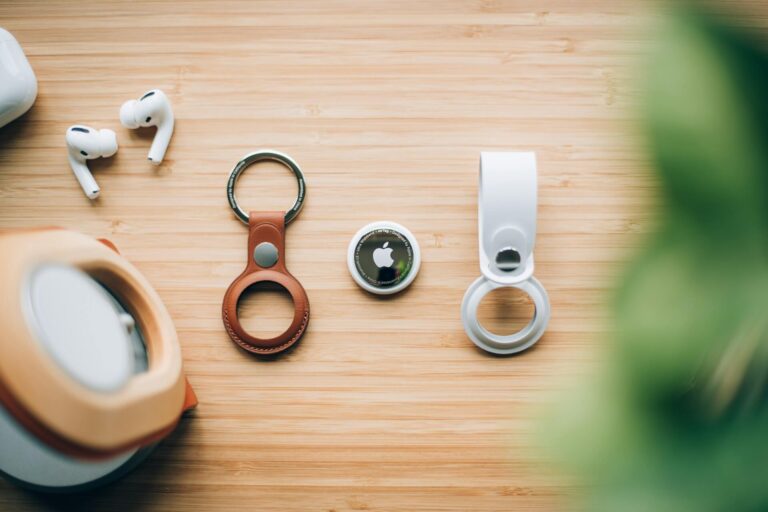 Airtag as a packing list item on a table with other items
